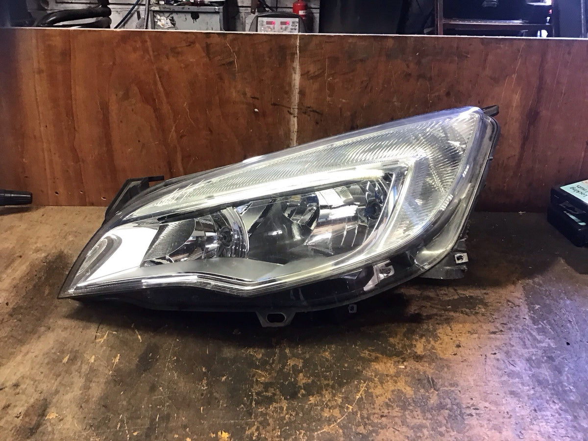 VAUXHALL ASTRA J PASSENGERS SIDE HEADLIGHT SILVER INSERT 1LG010011 03 2009 20129