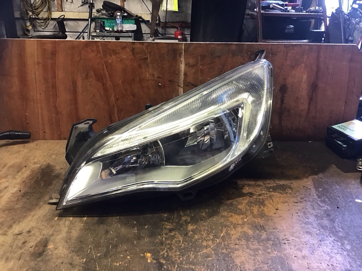 VAUXHALL ASTRA J PASSENGERS SIDE HEADLIGHT SILVER INSERT 1LG010011 03 2009 20121