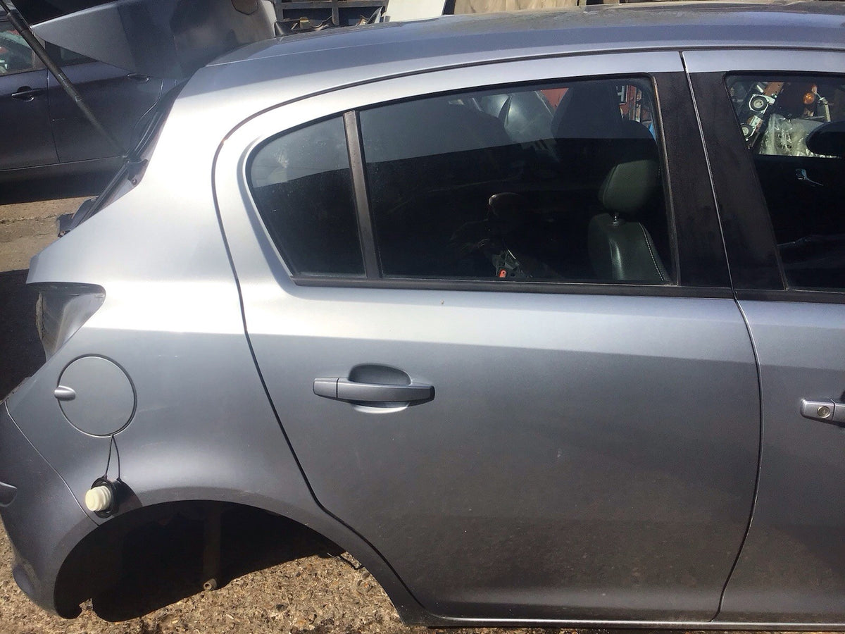 VAUXHALL CORSA D DRIVERS SIDE O/S REAR DOOR IN SILVER LAKE 5 DOOR 2006 20144