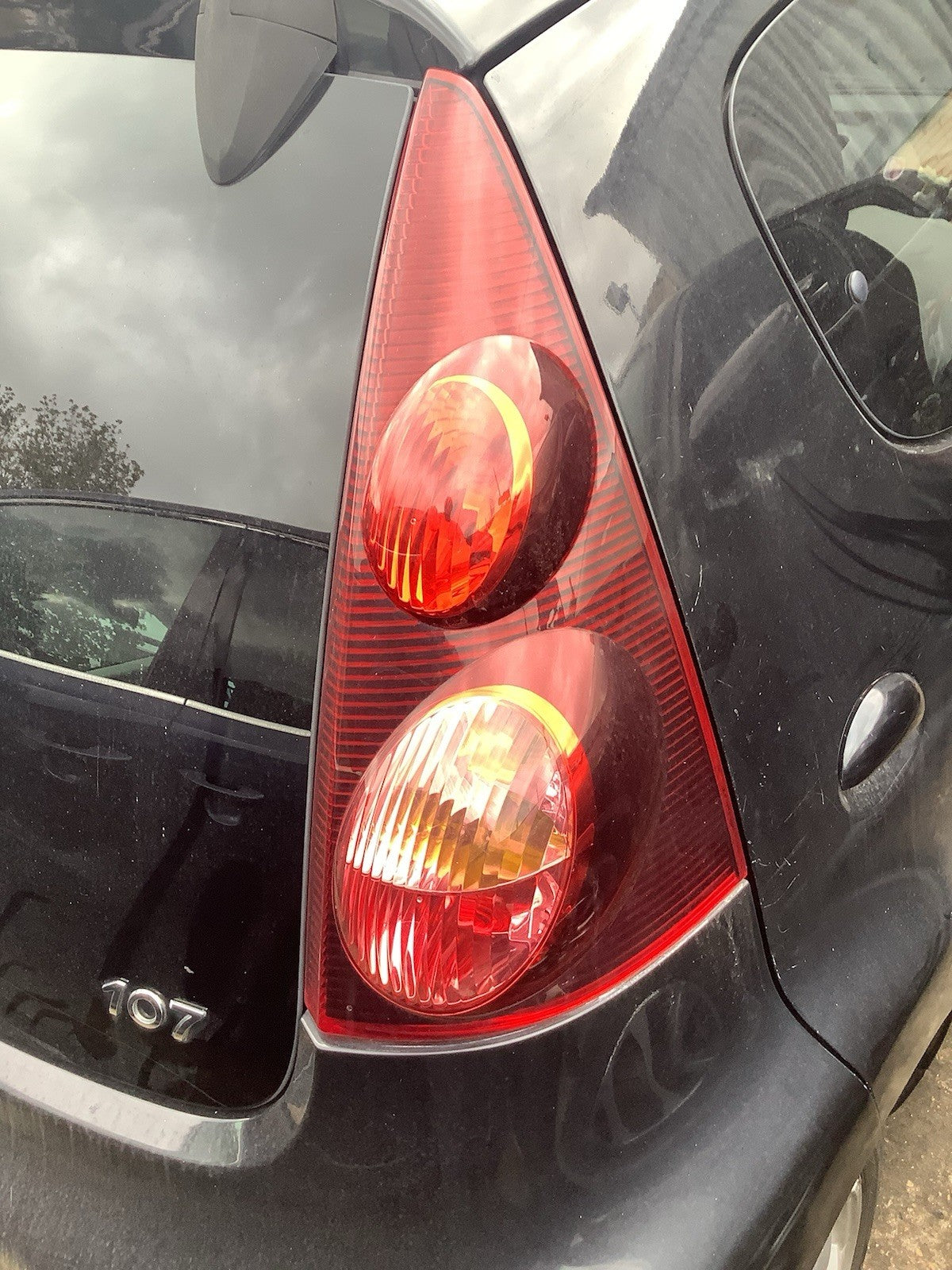 PEUGEOT 107 DRIVER'S SIDE O/S REAR LIGHT DARK TINT 2012 20144