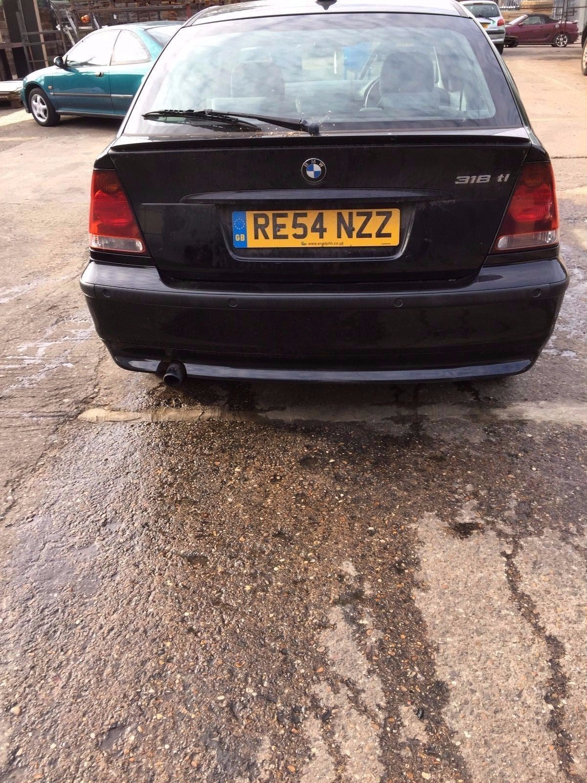E46 BMW 318 TI  REAR BUMPER IN BLACK PAINT CODE SCHWARZ 2 ( 668 )PARKING SENSORS0