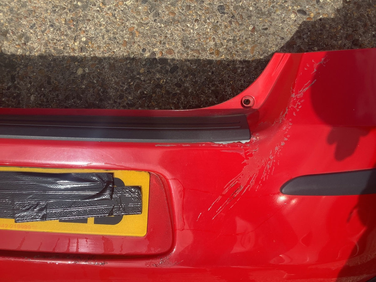 TOYOTA YARIS MK2 REAR BUMPER IN SUPER RED PAINT CODE 3P0 NEEDS PAINT 2006 200911