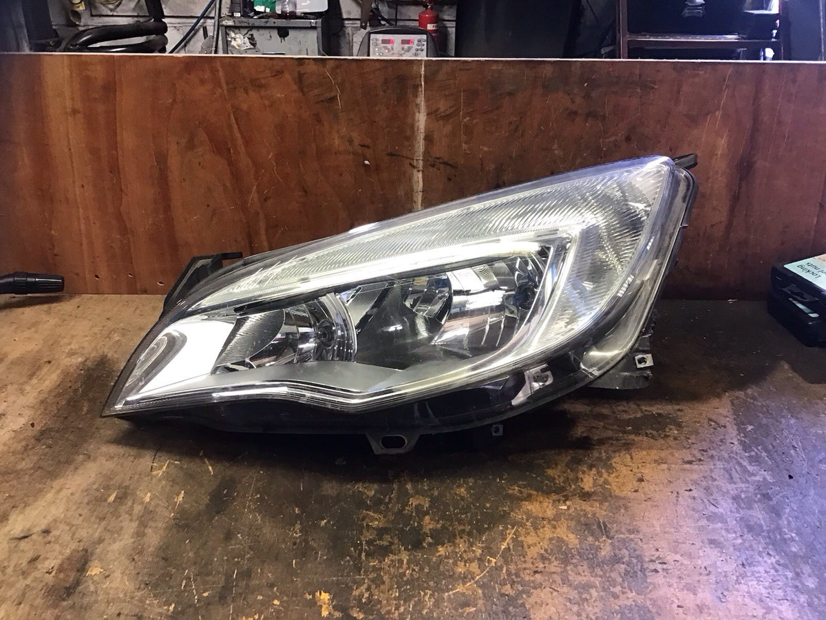 VAUXHALL ASTRA J PASSENGERS SIDE HEADLIGHT SILVER INSERT 1LG010011 03 2009 20128
