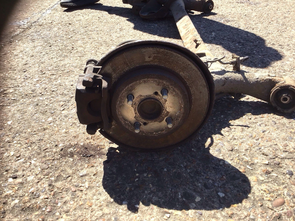TOYOTA YARIS 1.8 SR MK2 REAR AXLE DRUM DISK BRAKES WITH ABS 2006 201111