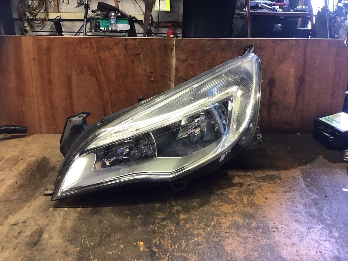 VAUXHALL ASTRA J PASSENGERS SIDE HEADLIGHT SILVER INSERT 1LG010011 03 2009 20122