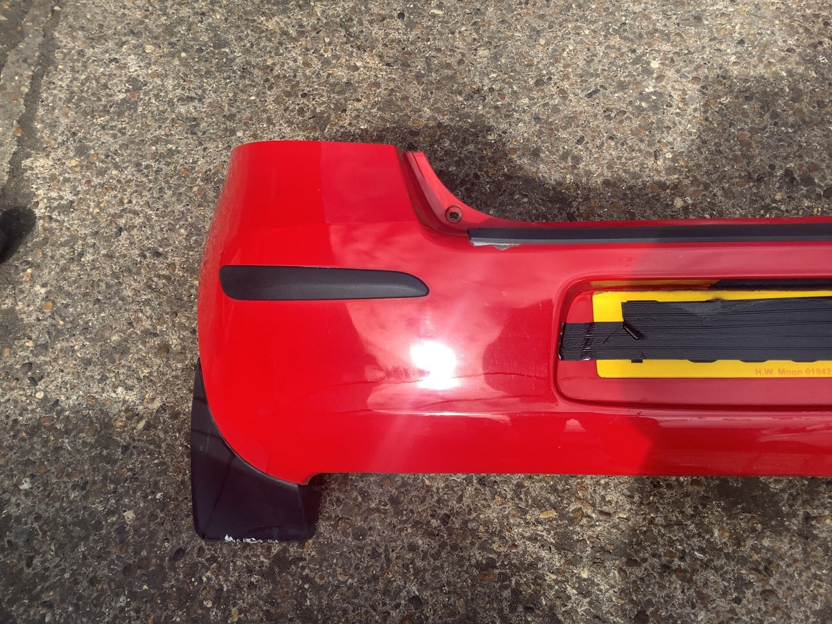 TOYOTA YARIS MK2 REAR BUMPER IN SUPER RED PAINT CODE 3P0 NEEDS PAINT 2006 20094