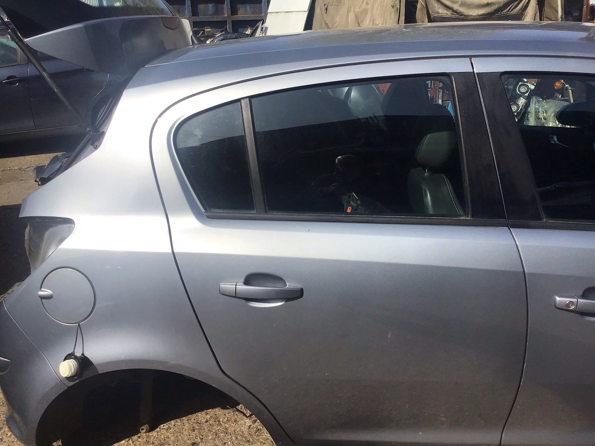 VAUXHALL CORSA D DRIVERS SIDE O/S REAR DOOR IN SILVER LAKE 5 DOOR 2006 20143