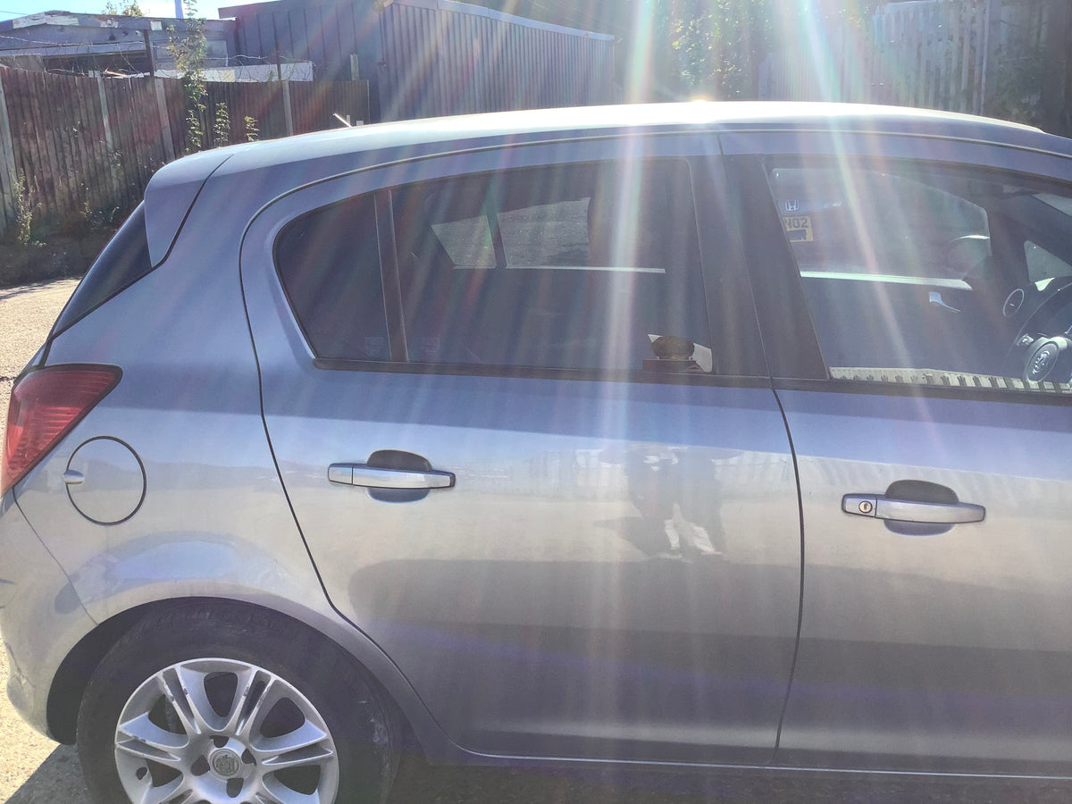 VAUXHALL CORSA D DRIVERS SIDE O/S REAR DOOR IN SILVER LAKE CODE Z179 2006-2014
